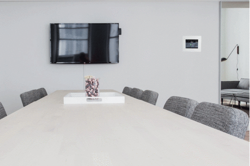 conference room with Poly P10 wall mount
